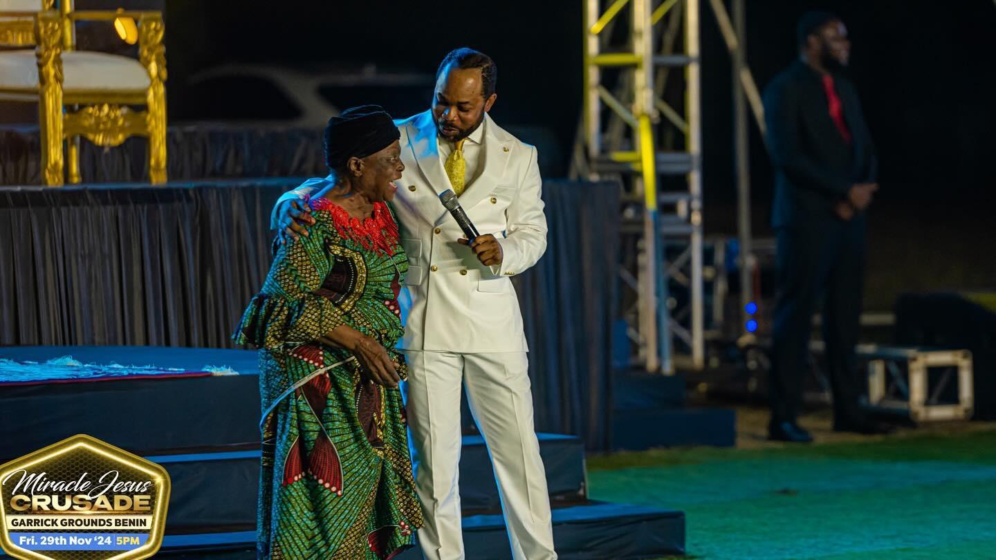 A woman celebrating her healing at An Evening With Jesus