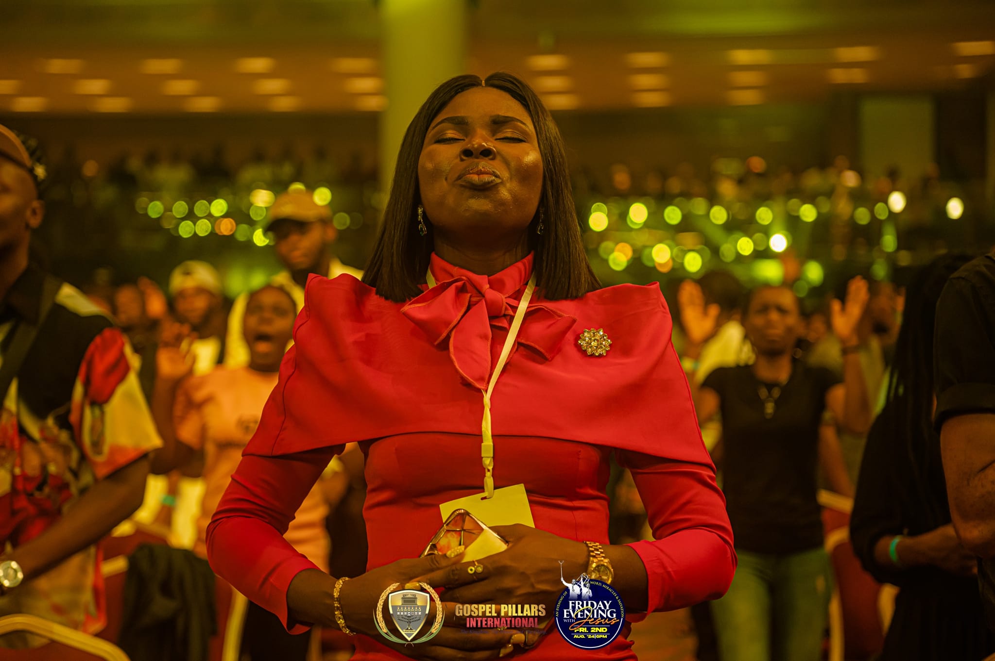 A worshipper deep in prayer at Eko Convention Centre, Lagos