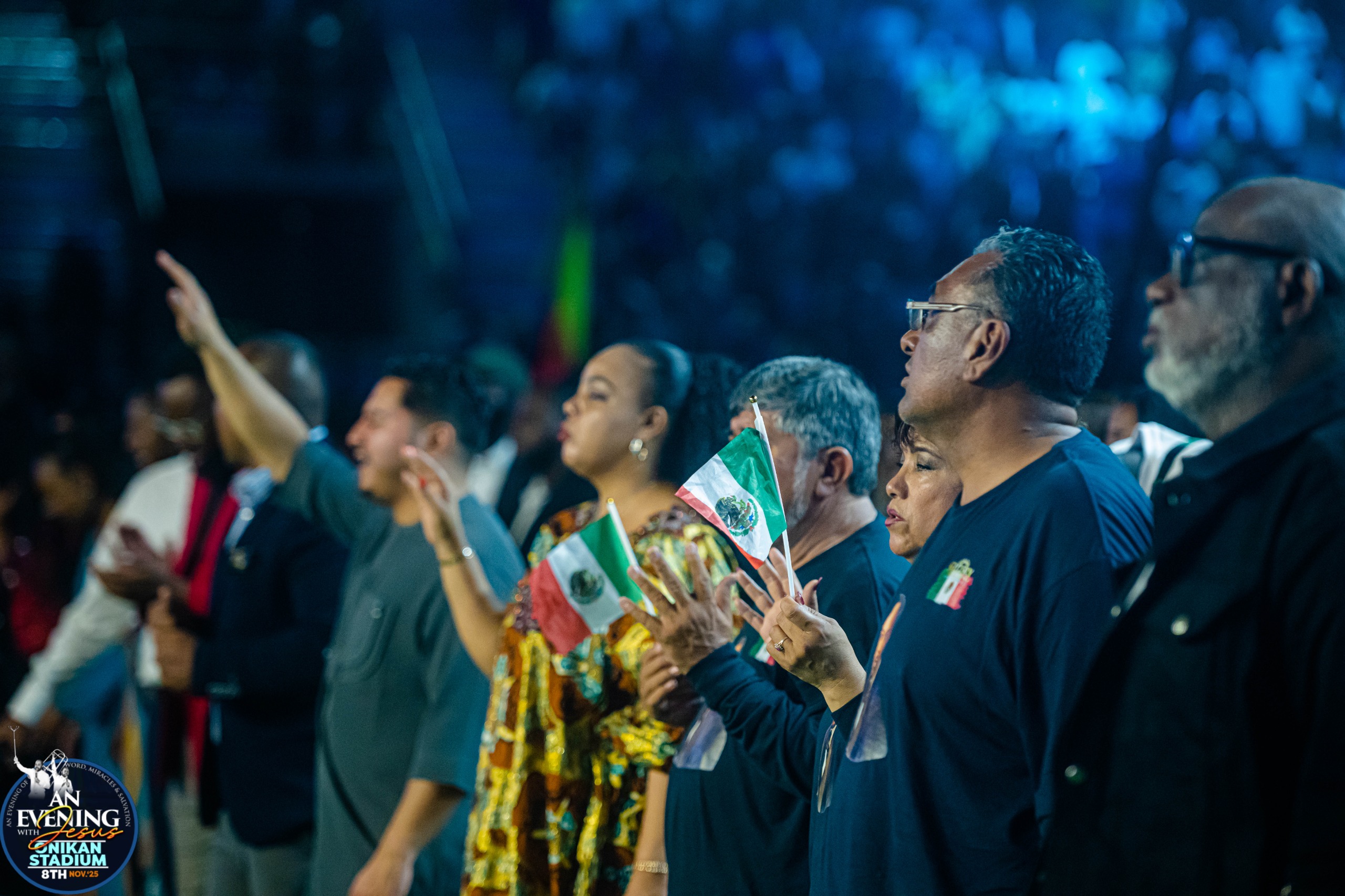 International attendees waving flags at An Evening With Jesus, Onikan Stadium