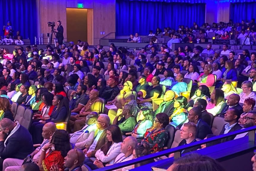 A full auditorium listening to the Word at An Evening With Jesus, Texas